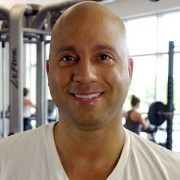 Smiling man with a shaved head